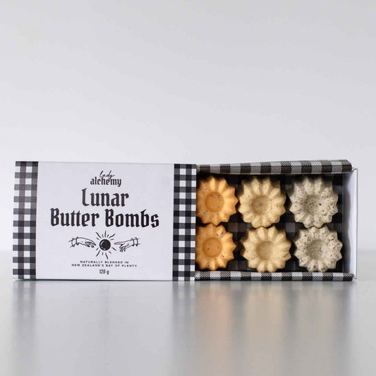 Box of Lunar Butter Bombs with checkered pattern on a white background