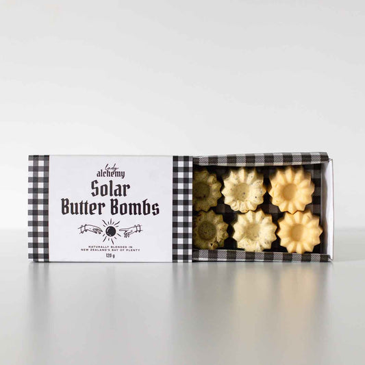 Box of Solar Butter Bombs with a checkered pattern on a white background