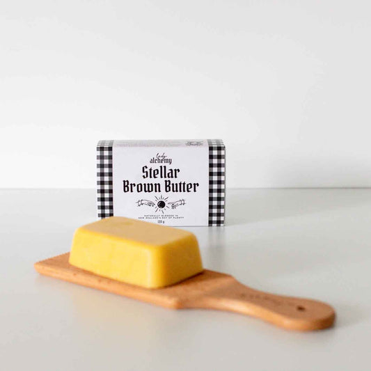 Brown Butter slab on a wooden board with a label in the background